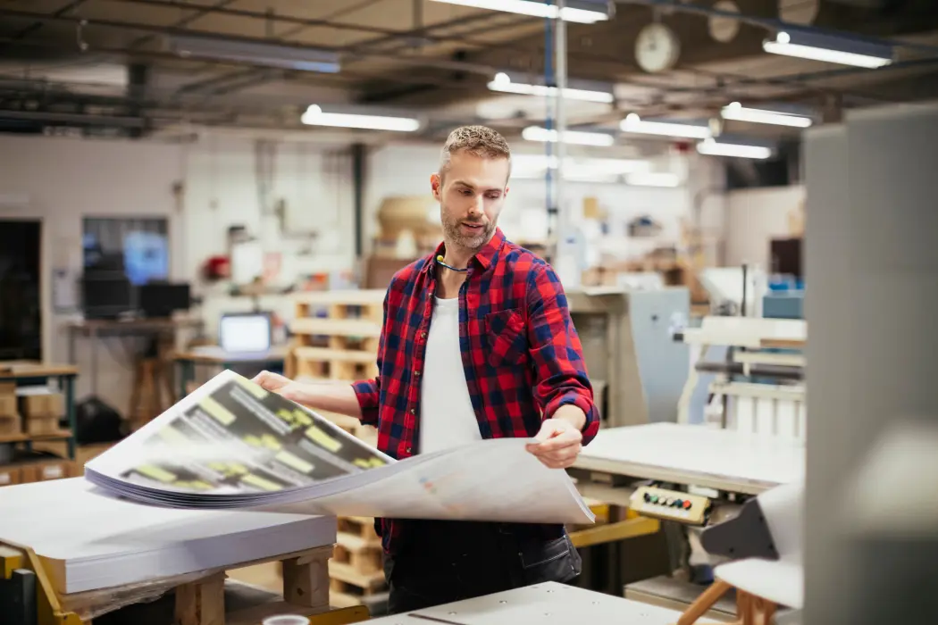 Équipe de TPP Total Prepress en atelier de prépresse